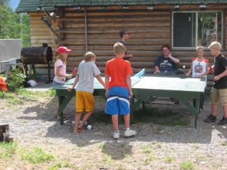 Campers at the ever-popular ping-pong table